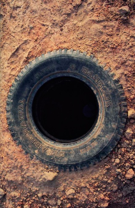 Untitled (The Tyre in the Ground) by Michel François